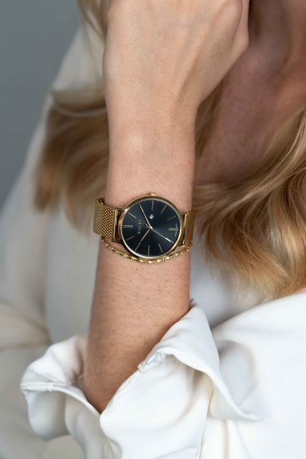 Gouden horloge met zwarte wijzerplaat sale