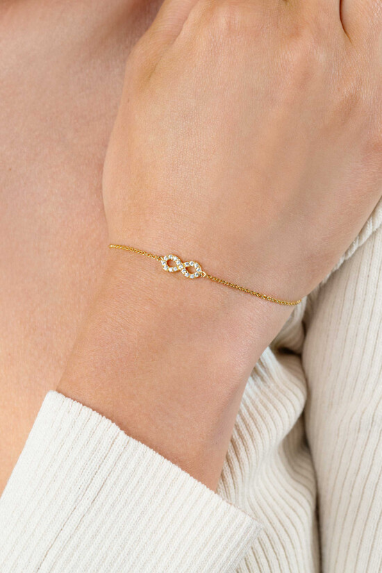 ZINZI gold plated zilveren armband met Infinity teken, vol bezet met witte zirconia's 17-19cm ZIA2597Y