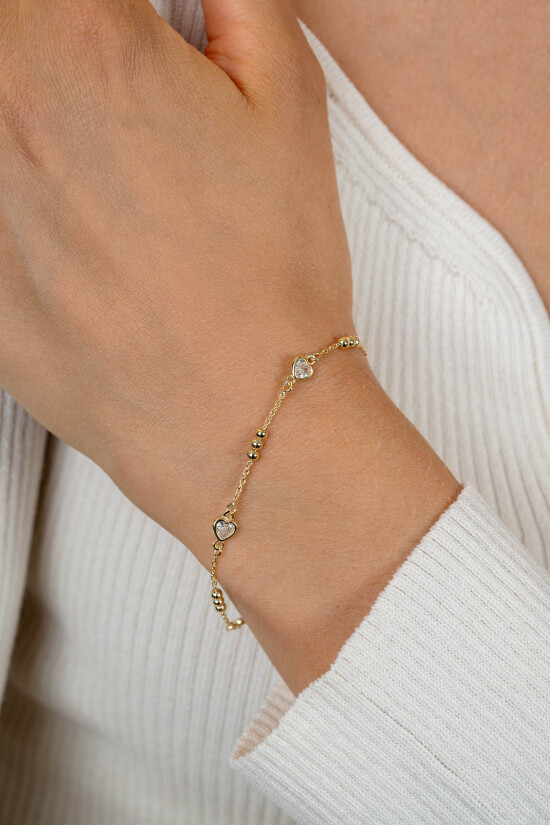 ZINZI gold plated zilveren schakelarmband met trio-bolletjes en drie hartvormige zirkonia's 17-20cm ZIA2679