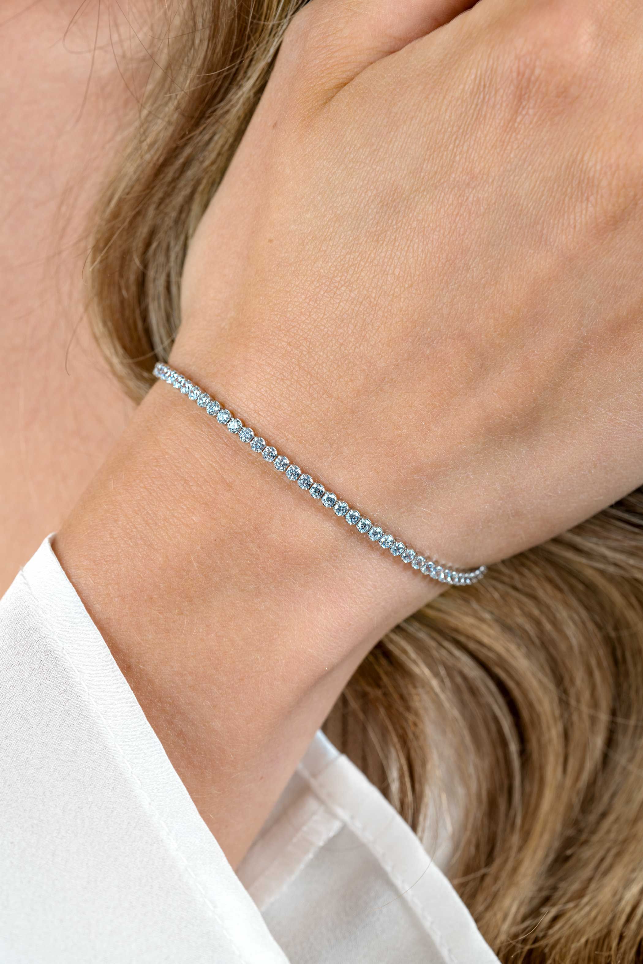 ZINZI zilveren tennis armband 2,5mm breed en bezet met witte zirconia's in ronde kastzettingen 17-20cm ZIA2590